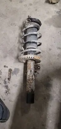 Volkswagen Polo IV 9N3 Front shock absorber with coil spring