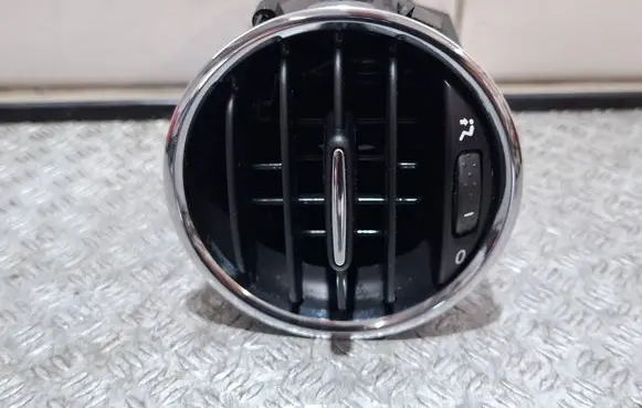 Fiat 500E Dash center air vent grill 735627419