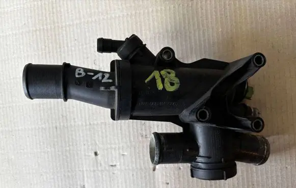 Thermostat/thermostat housing