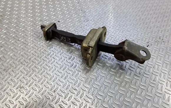 Nissan Primera Rear door check strap stopper
