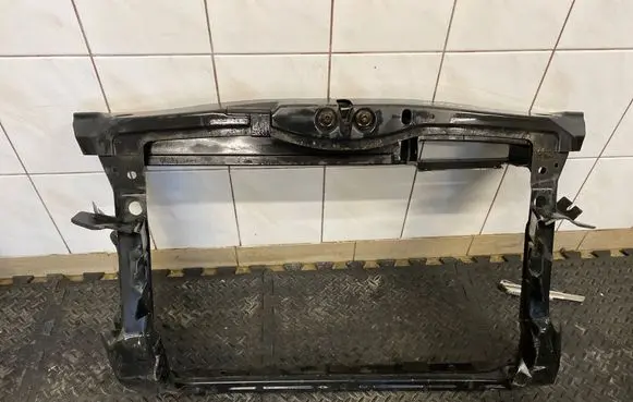 Radiator support slam panel