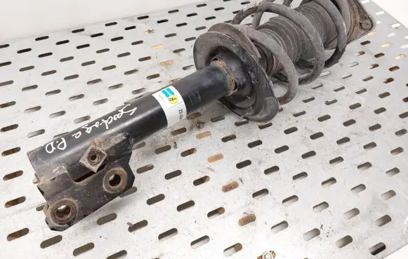 Front shock absorber with coil spring