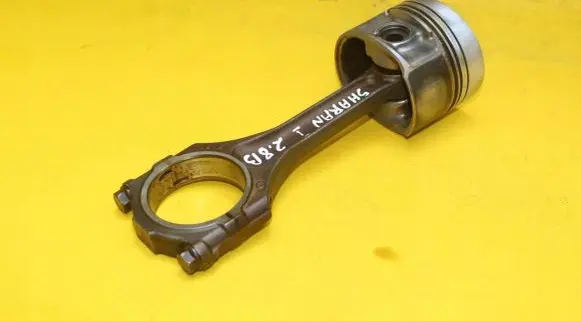 Piston with connecting rod