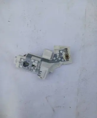 Tail light bulb cover holder