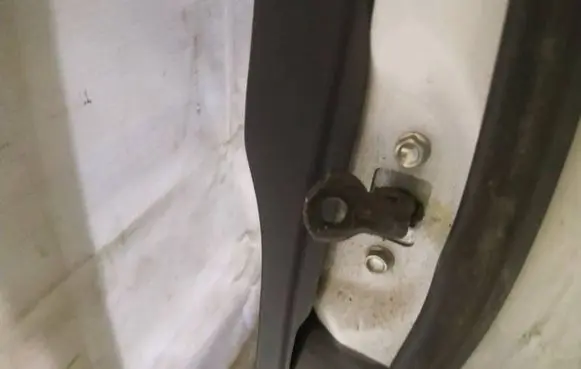Mazda CX-5 Rear door check strap stopper
