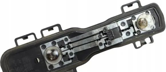 Nissan Primera Tail light bulb cover holder 89025242