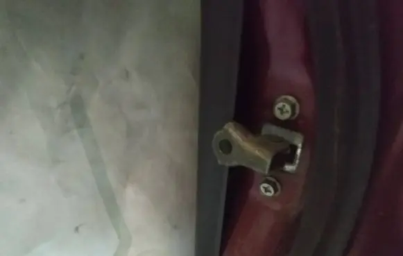 Suzuki Liana Rear door check strap stopper
