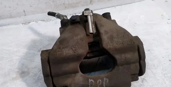 Volkswagen Touareg I Front brake caliper 7L6106D