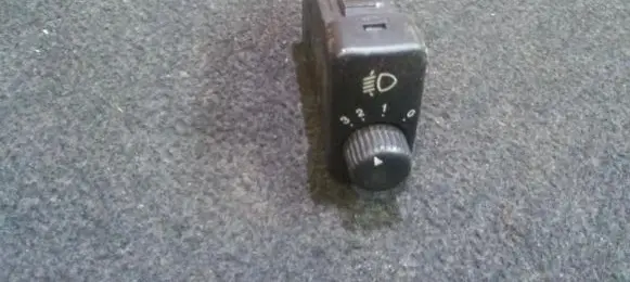 Headlight level height control switch