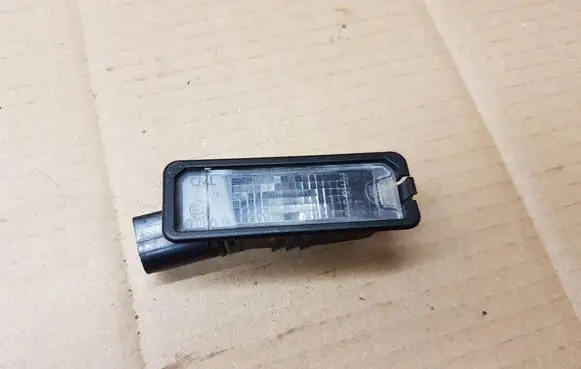 Volkswagen Eos Number plate light 1K8943021