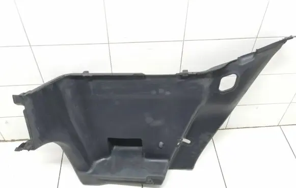 Trunk/boot lower side trim panel