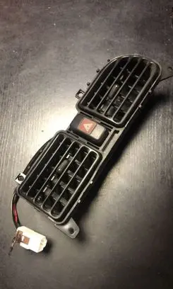 Mazda 323 Dash center air vent grill BCIDGM931