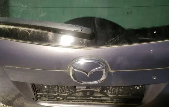 Mazda CX-7 Trunk door license plate light bar 