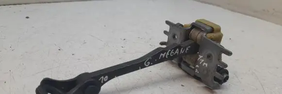 Rear door check strap stopper