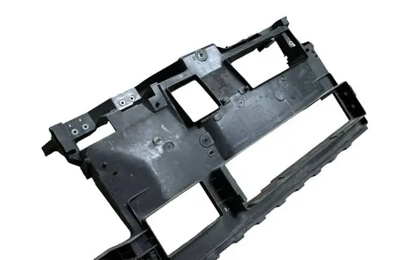 Radiator support slam panel