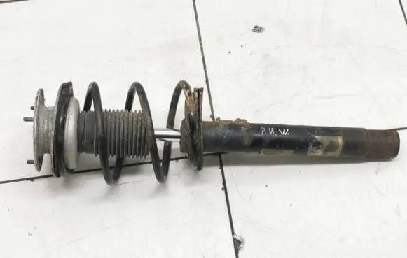 Front shock absorber with coil spring