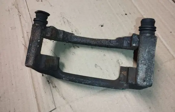 Ford Taurus Front Brake Caliper Pad/Carrier 