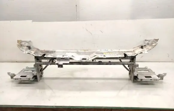 Top upper radiator support slam panel