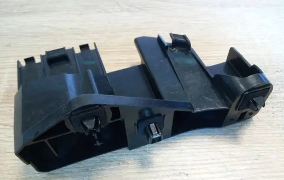 Suzuki Swift II Rear bumper mounting bracket 7182468L0 NE69175