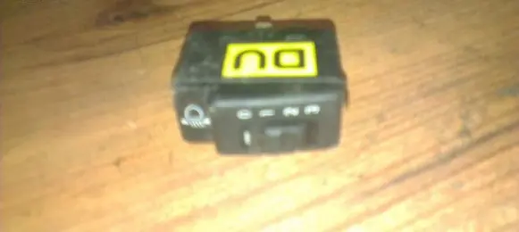 Headlight level height control switch