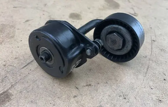BMW 3 E46 Air conditioning tensioner 7787371 64557787371 64557786076