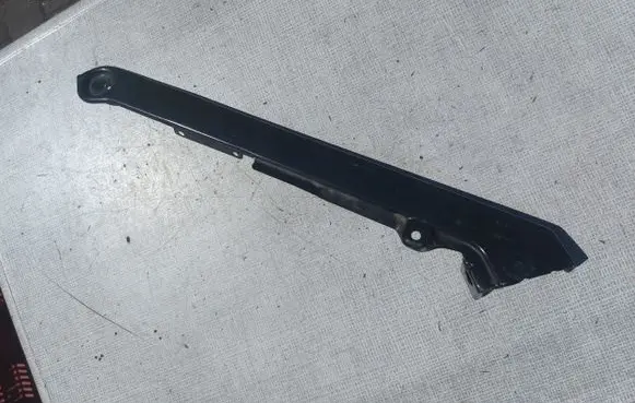 Engine bonnet/hood lock trim molding