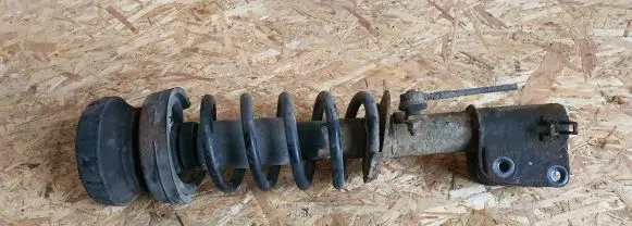 Nissan Primastar Front shock absorber with coil spring