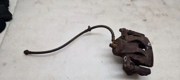 Suzuki Grand Vitara II Front brake caliper