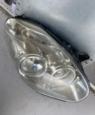 Fiat Doblo Headlight/headlamp 61810671 04638099900010