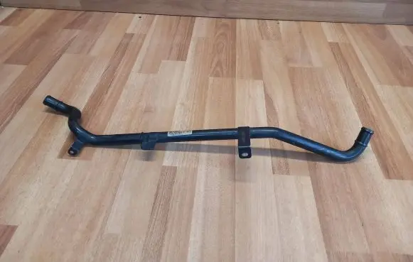 Volkswagen Touareg I Engine coolant pipe/hose 07Z121065K