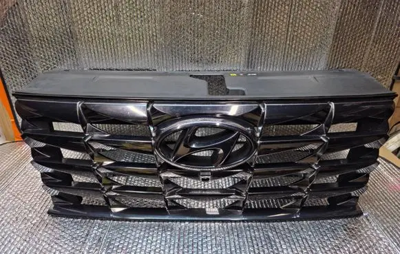 Hyundai Tucson IV NX4 Front bumper upper radiator grill 86351N7110
