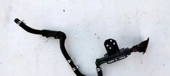 Hyundai Tucson TL Headlight washer spray nozzle