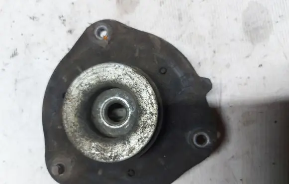 Volkswagen Touran I Coil spring mount 1K0412331