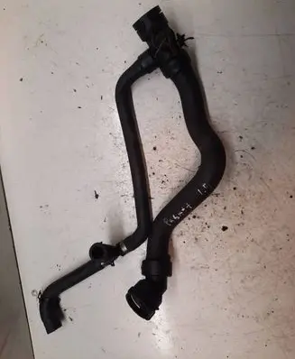 Volkswagen PASSAT B5.5 Engine coolant pipe/hose 4b0973712