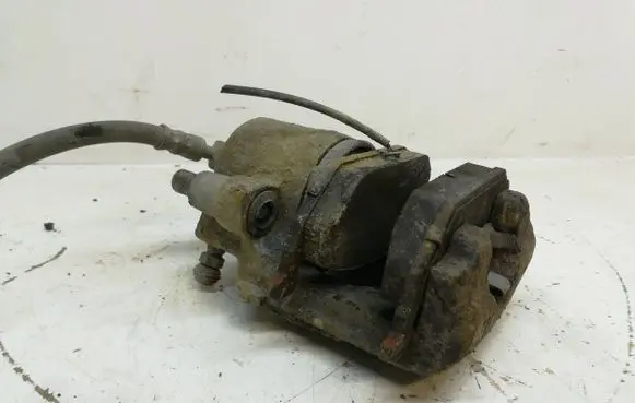 Volkswagen Golf V Front brake caliper