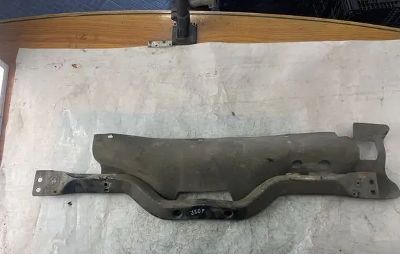 Top upper radiator support slam panel