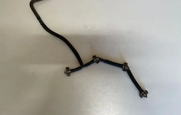 Volkswagen Golf VII Fuel return line/hose 04L1302656