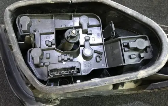 Citroen Xsara Tail light bulb cover holder