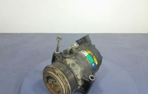 Opel Zafira B Air conditioning (A/C) compressor (pump) 13124752