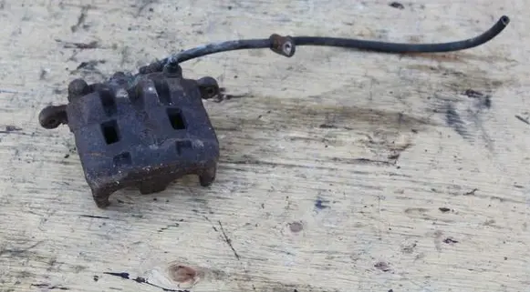 Subaru Forester SG Front brake caliper