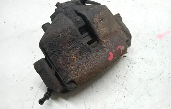 Volkswagen Golf V Front brake caliper