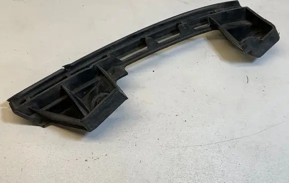 Volkswagen Touran I Front bumper mounting bracket 1T0807889B