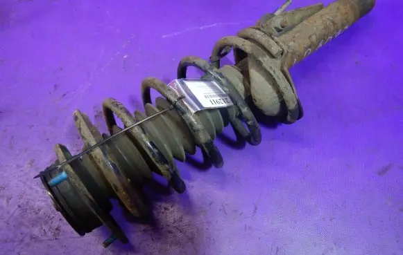 Ford Escort Front shock absorber with coil spring