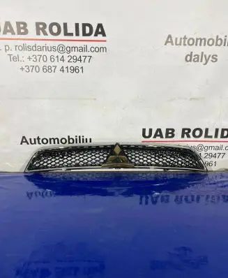 Mitsubishi Lancer VIII Front bumper upper radiator grill 7450A093
