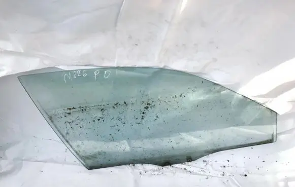 Mazda 626 Front door window glass four-door