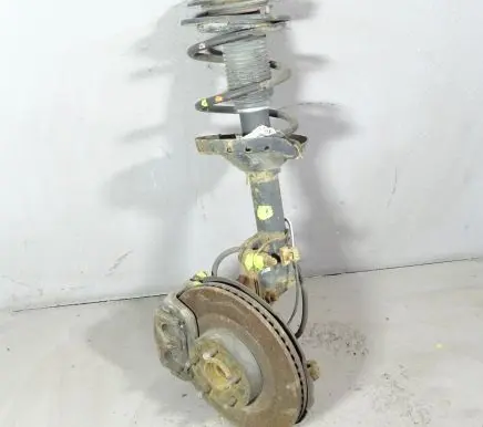Subaru Legacy Front shock absorber with coil spring