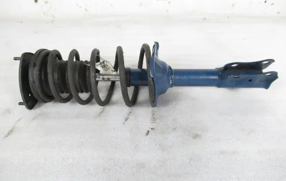 Toyota Yaris Front shock absorber with coil spring