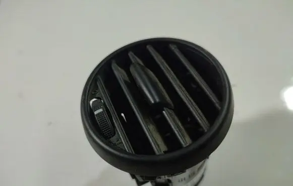 Dash center air vent grill