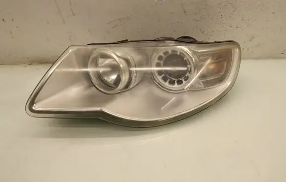 Volkswagen Touareg I Headlight/headlamp 25402700