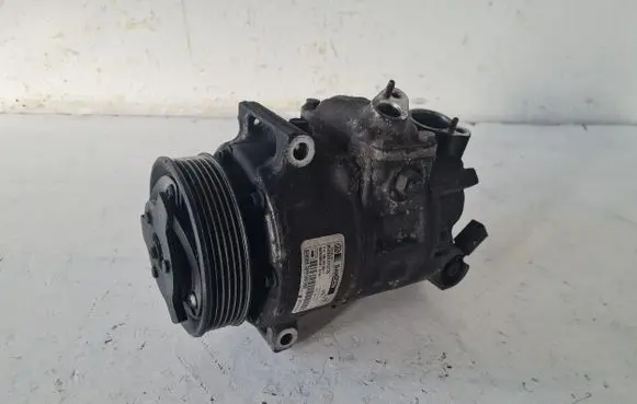 Volkswagen Golf V A/C compressor mount bracket 1K0820859F